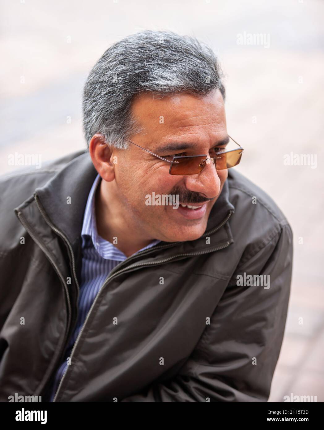 Portrait of an Iranian Arabic business man in a shopping center Stock Photo