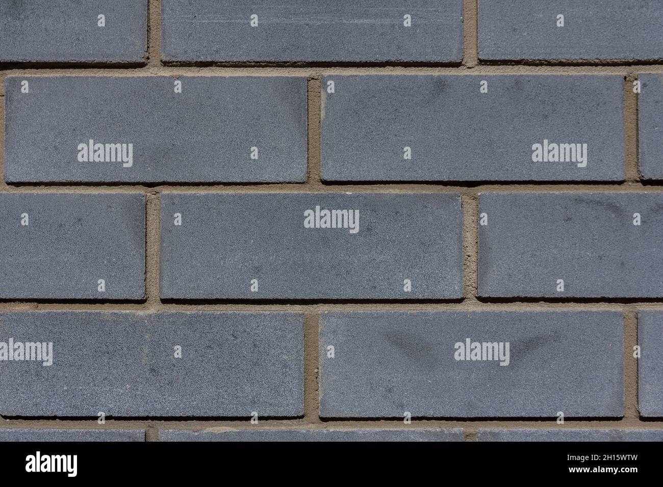 Background of brick wall. Gray brick close-up Stock Photo
