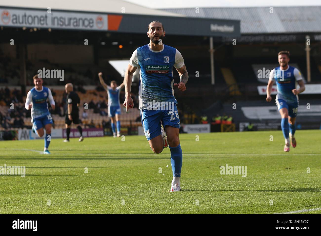 BURSLEM, UK. OT 16TH Oliver Banks of Barrow run to celebrate after scoring their first goal during the Sky Bet League 2 match between Port Vale and Barrow at Vale Park, Burslem on Saturday 16th October 2021. (Credit: Mark Fletcher | MI News) Credit: MI News & Sport /Alamy Live News Stock Photo