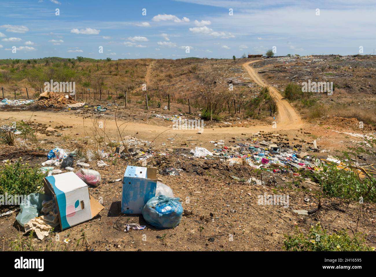 Garbage thrown into nature in Barro, Ceara, Brazil on December 21, 2020. Environmental pollution. Stock Photo