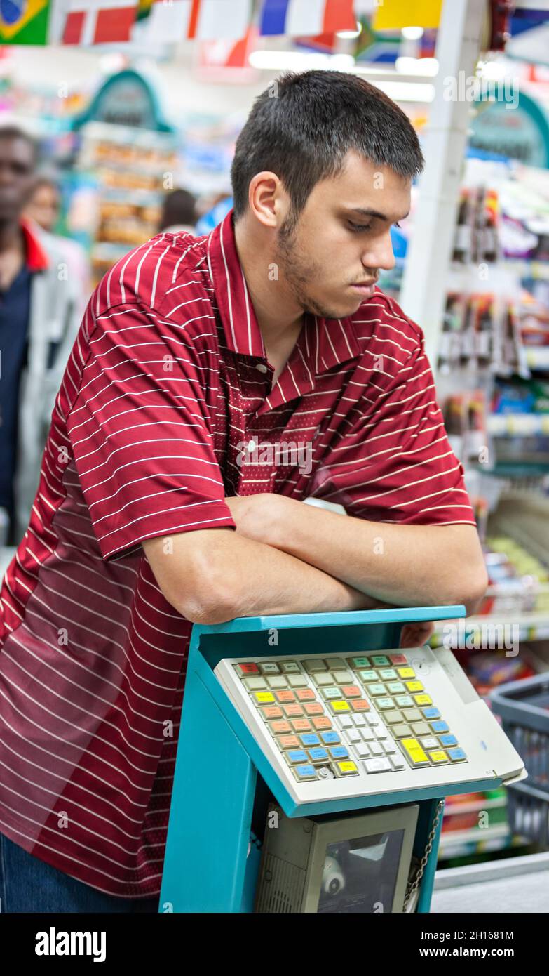 teenager with a t-shirt portrait , shopping in a supermarket Stock Photo