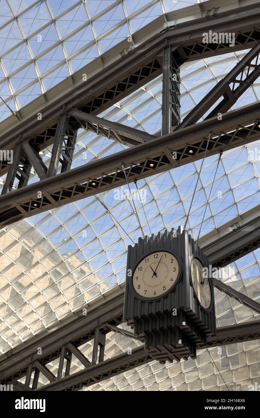 Head house clock under glass skylights in Moynihan Train Hall at Penn