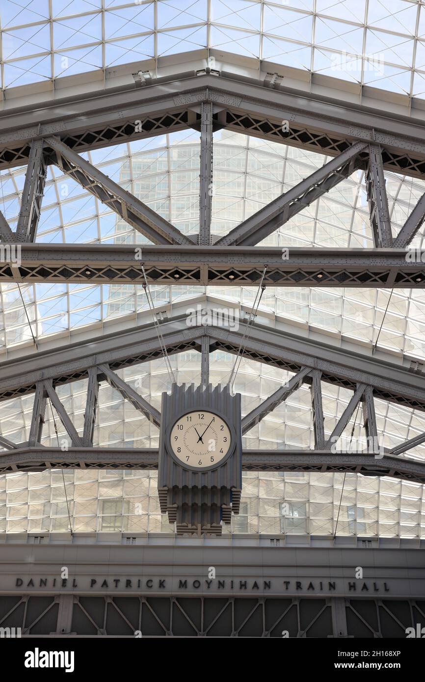 Head house clock under glass skylights in Moynihan Train Hall at Penn