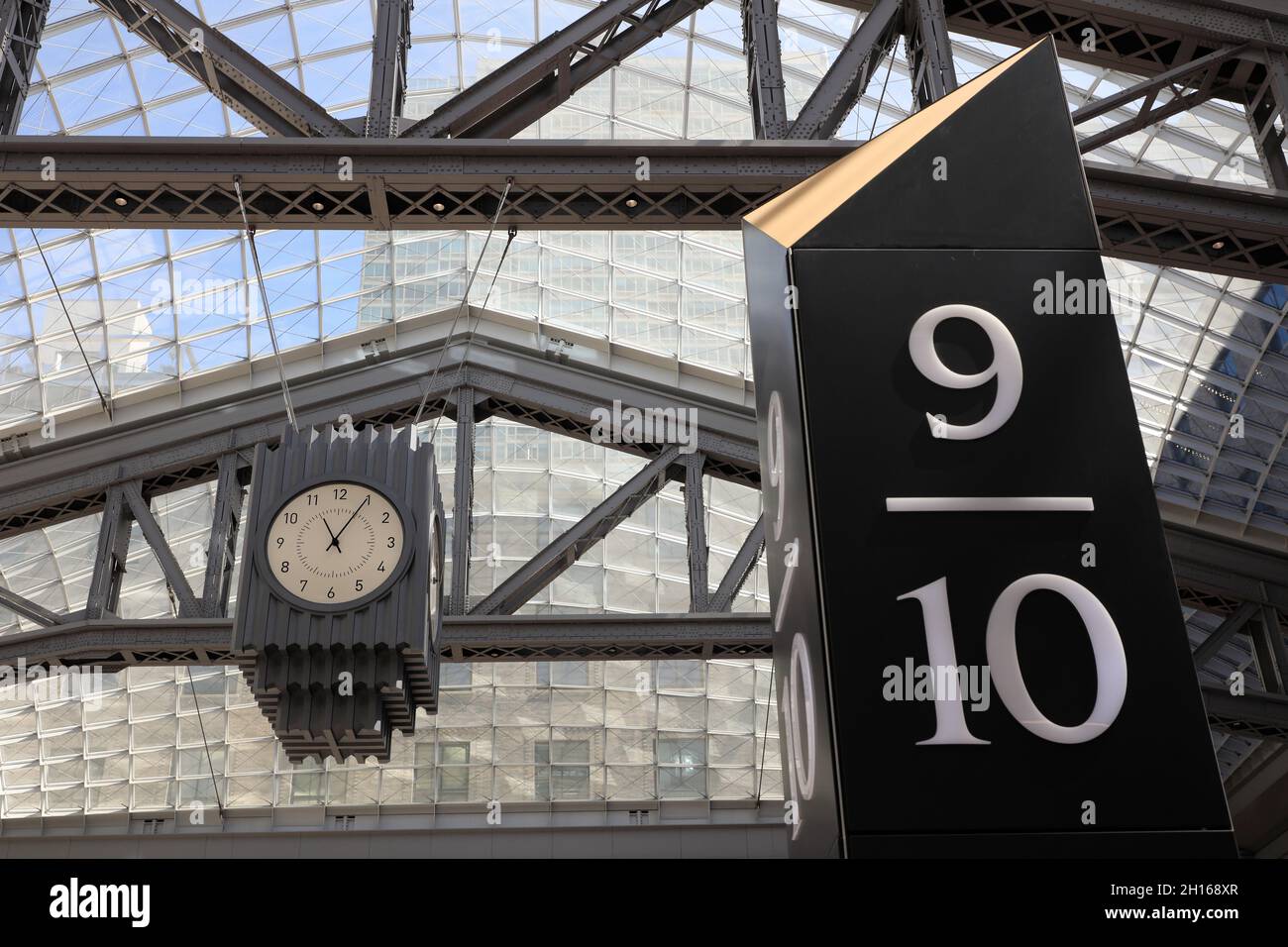 Head house clock under glass skylights in Moynihan Train Hall at Penn