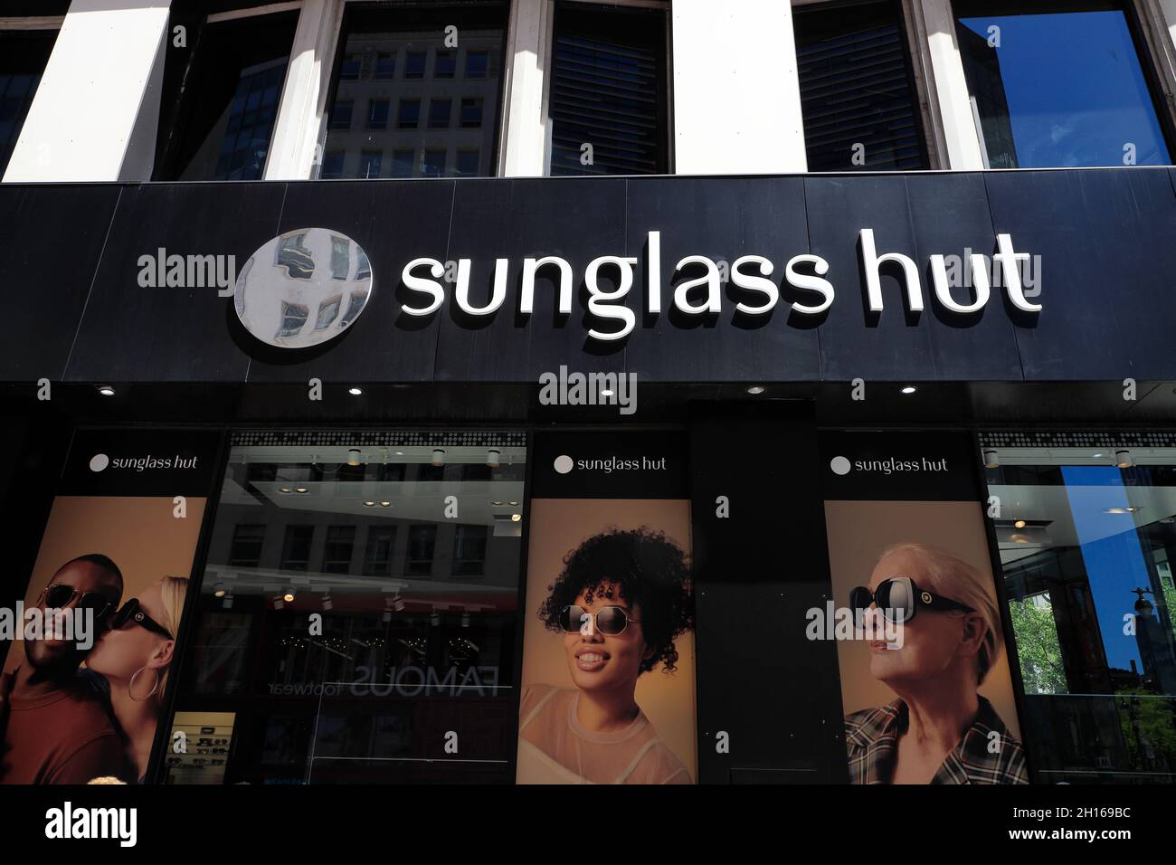 the storefront of sunglass hut at 34th streetmidtown manhattannew york cityusa 2H169BC