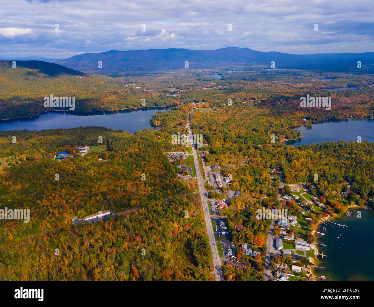Center Harbor town center aerial view in fall including Lake Kanasatka
