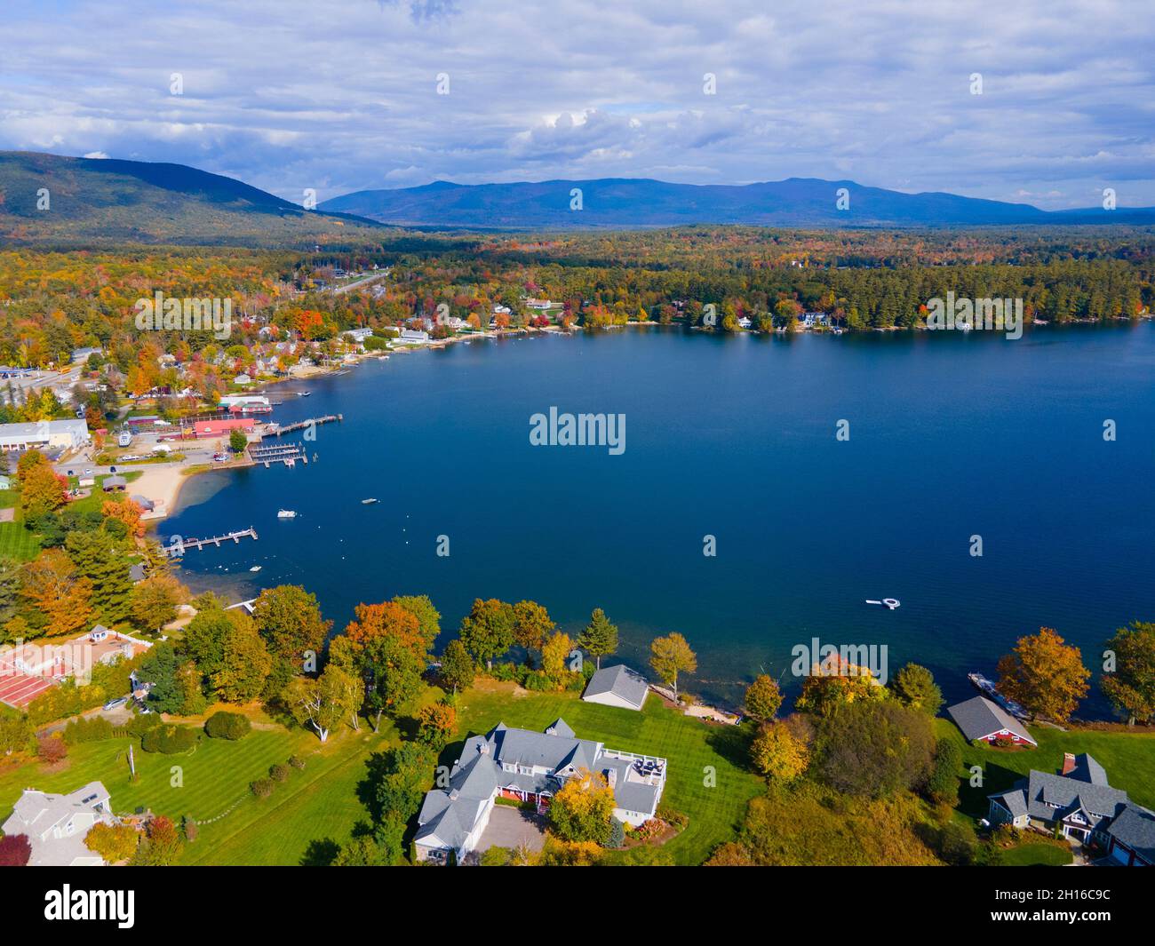 Center Harbor town center aerial view in fall with waterfront of Lake