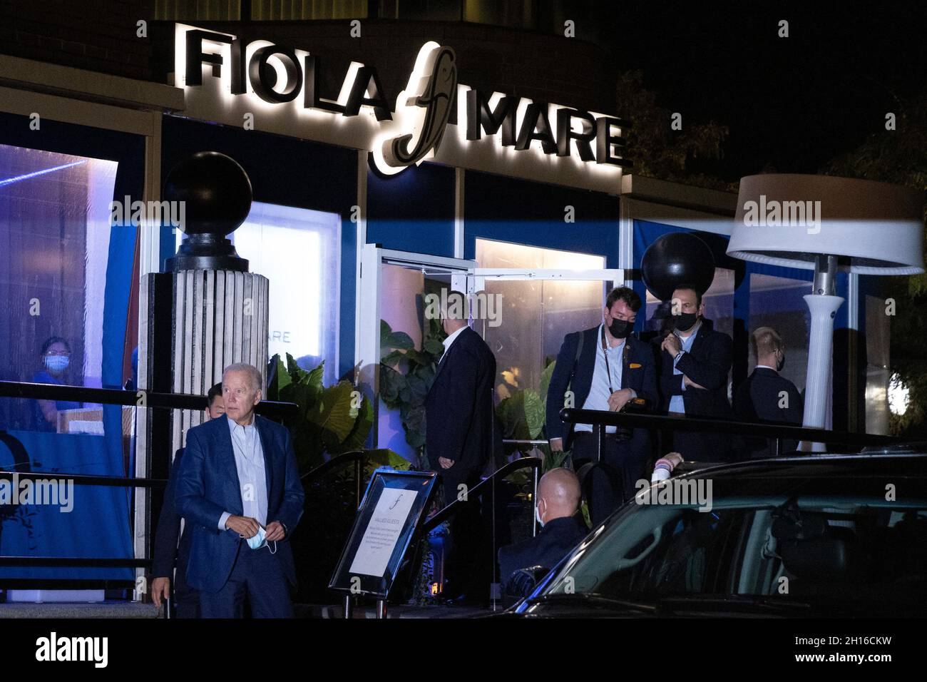 Washington, DC. 16th Oct, 2021. United States President Joe Biden walks outside Fiola Mare restaurant in Washington, DC on Saturday, October 16, 2021. The President and first lady came from church service and enjoyed date night, out in Washington, DC. Credit: Tasos Katopodis/Pool via CNP/dpa/Alamy Live News Stock Photo