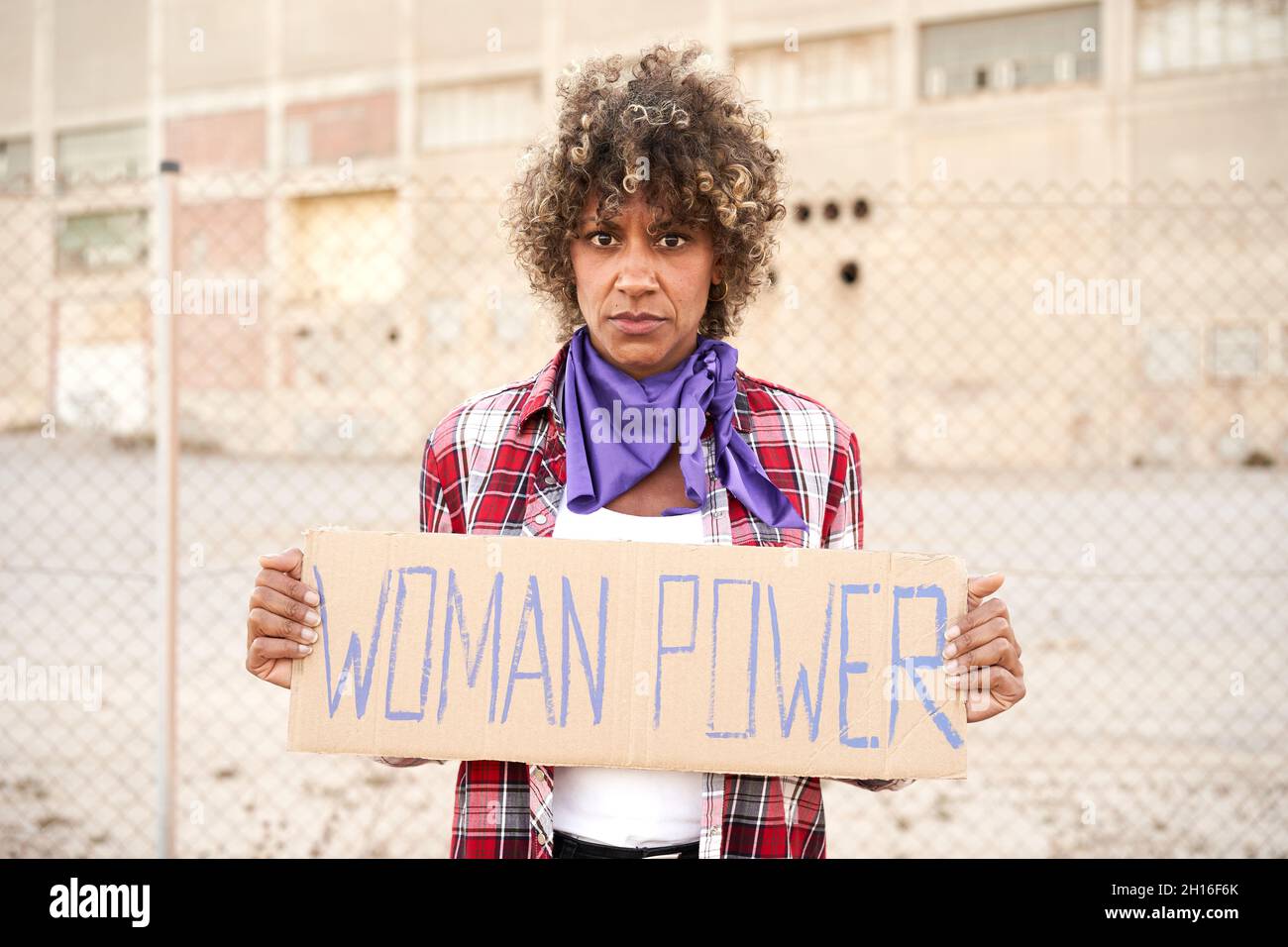 Woman holding a sign Women Power. Nationwide women's strike. Stock Photo
