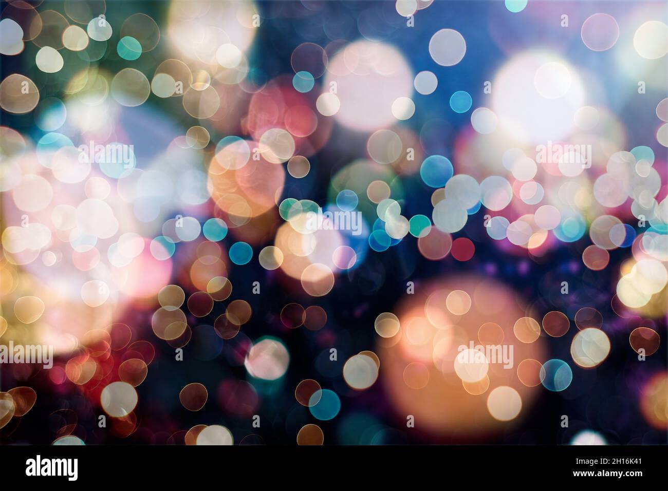 Abstract light celebration background with defocused golden lights for ...