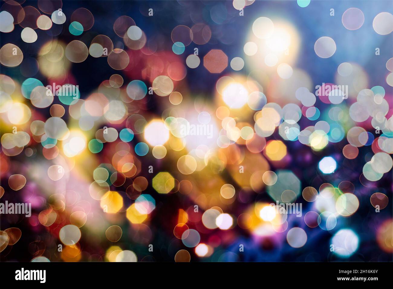 Abstract light celebration background with defocused golden lights for ...