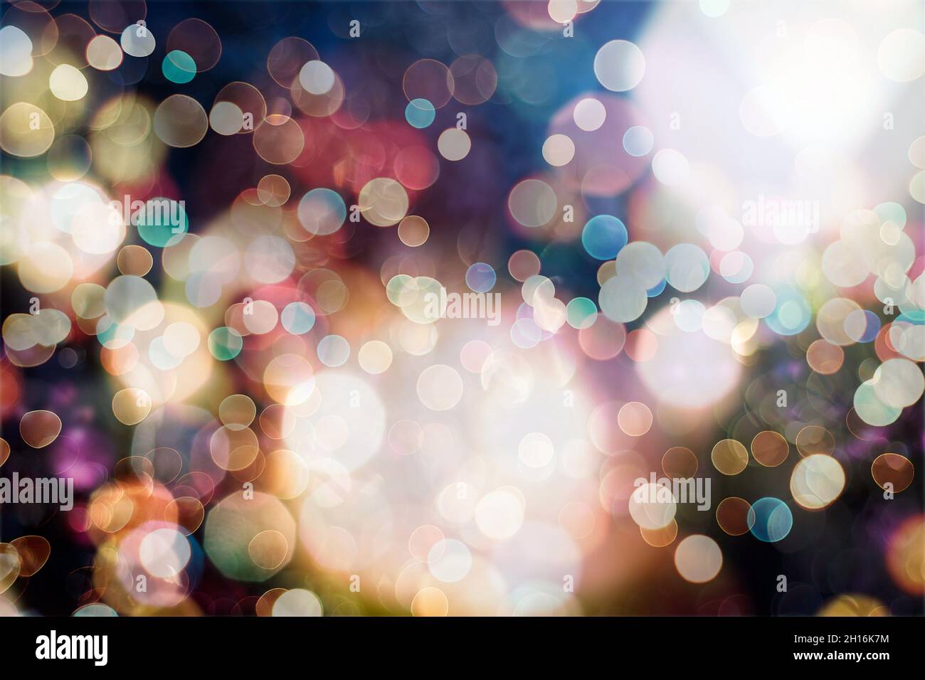 Abstract light celebration background with defocused golden lights for ...