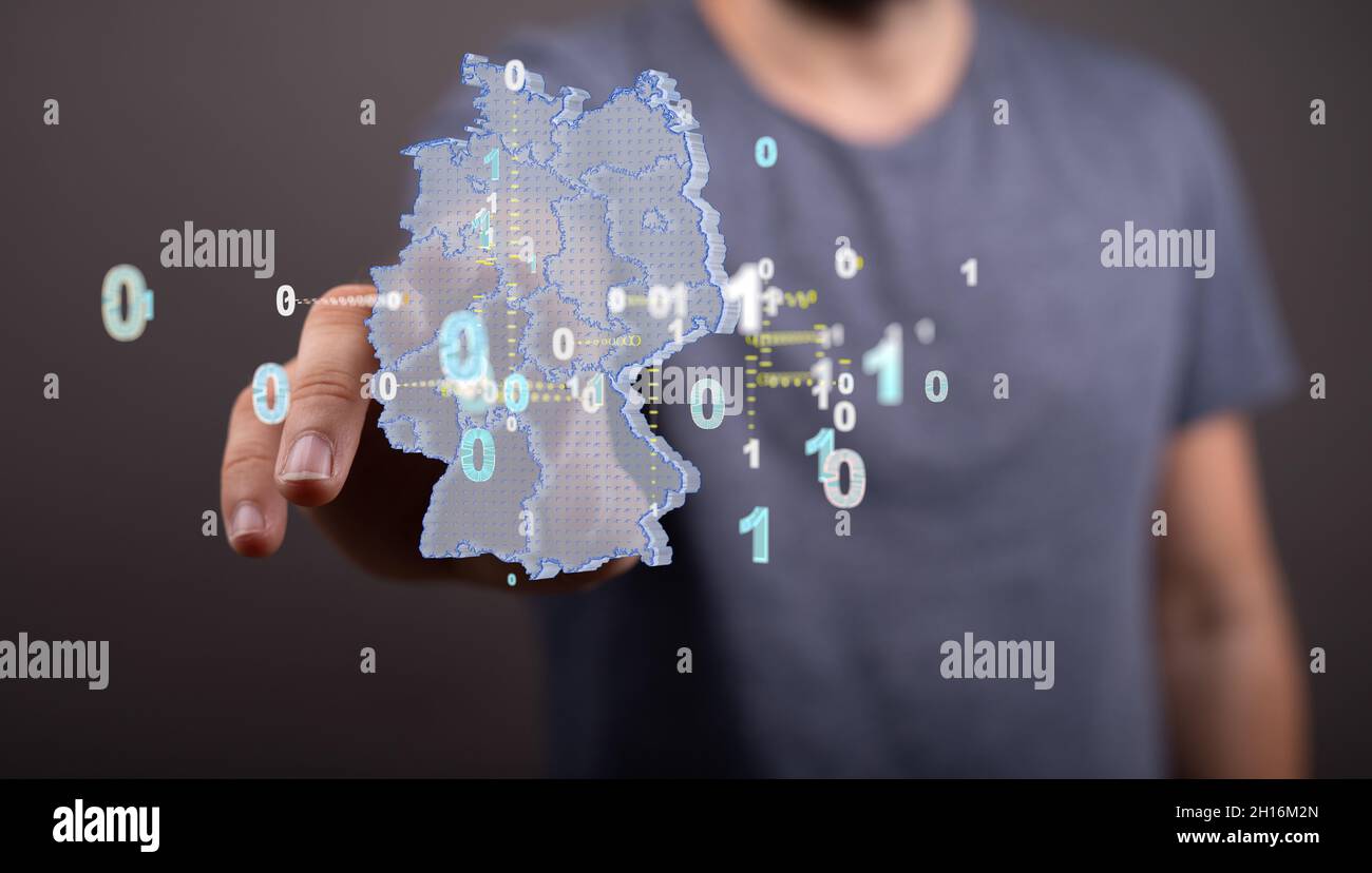 A person presenting the virtual projection of digital binary codes ...