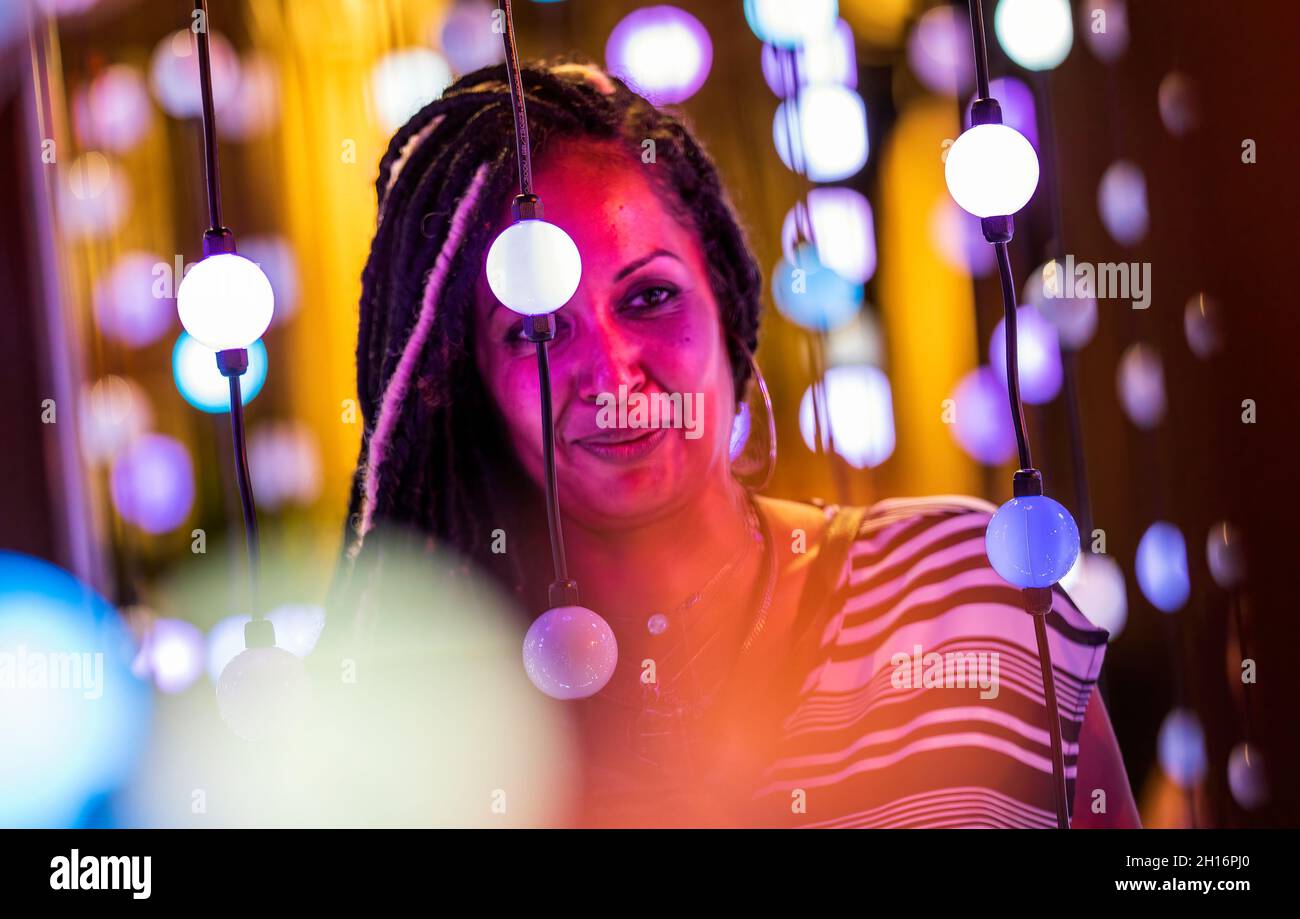 Orlando, United States. 12th Oct, 2021. Attendee enjoys a light