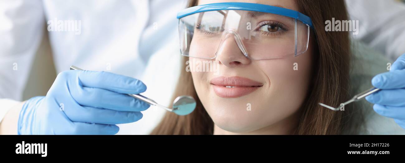 Portrait of beautiful woman at dentist appointment Stock Photo