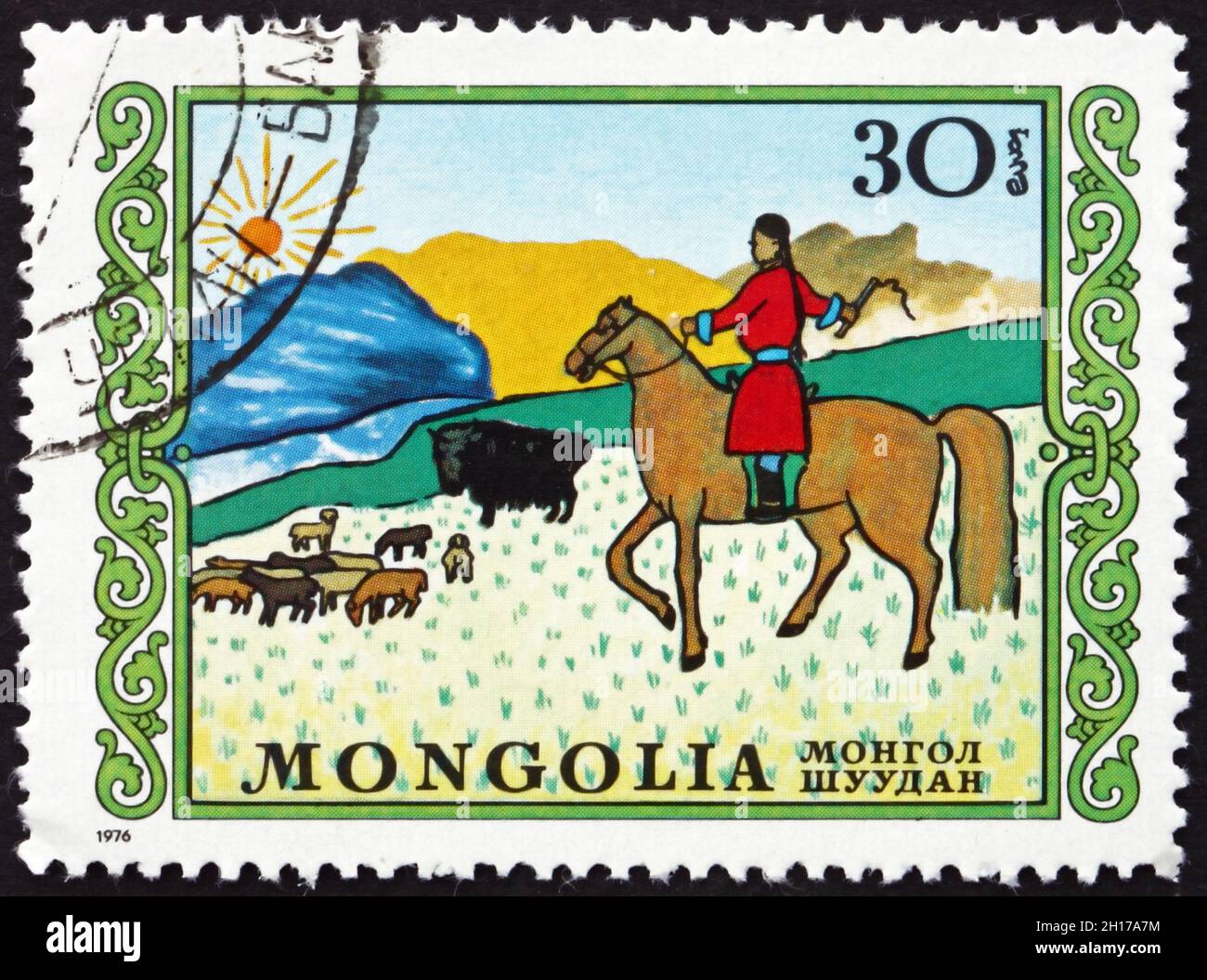 MONGOLIA - CIRCA 1976: a stamp printed in Mongolia shows Herding, International Children's Day, circa 1976 Stock Photo