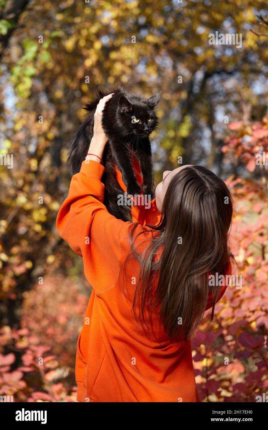 Autumn leaves in woman hi-res stock photography and images - Alamy