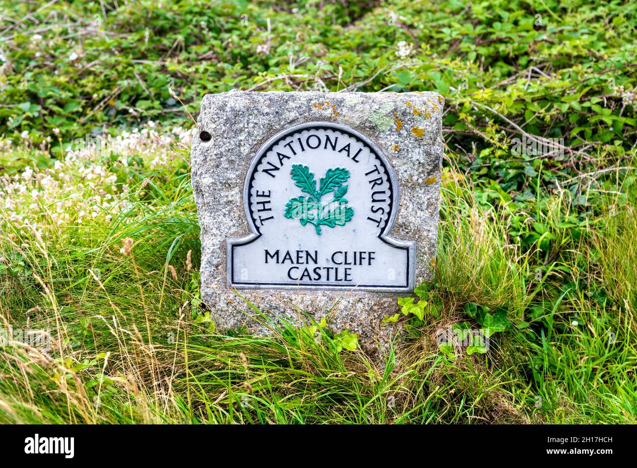 Sign for Maen Cliff Castle promontory fort near Land's End, Cornwall, UK Stock Photo