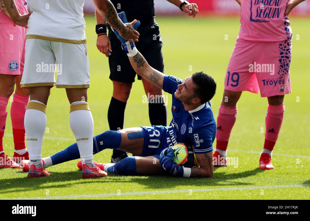 Soccer Football - Ligue 1 - Troyes v OGC Nice - Stade de l'Aube, Troyes,  France - October 17, 2021 Troyes' Gauthier Gallon down injured  REUTERS/Pascal Rossignol Stock Photo - Alamy
