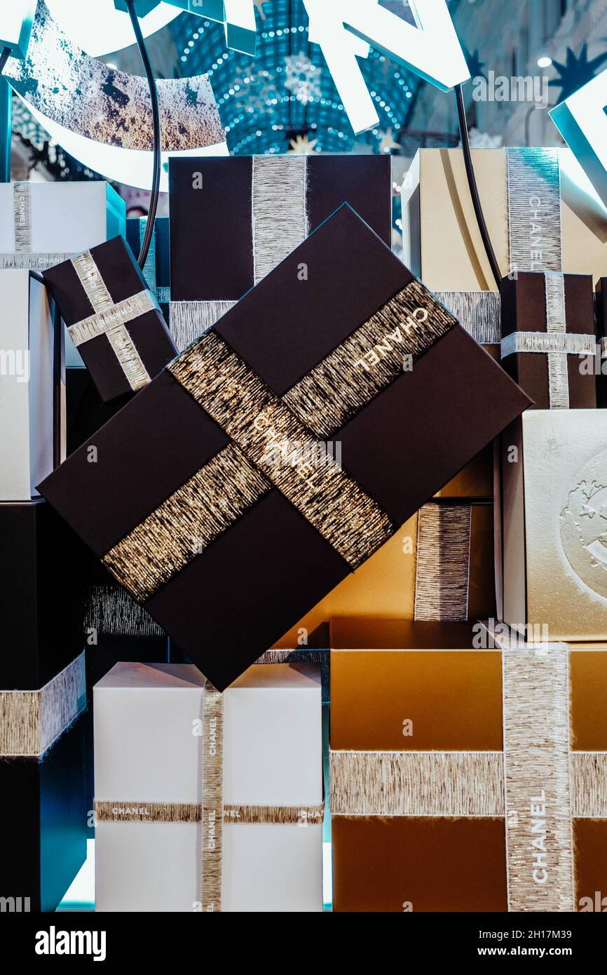 Chanel Gold and Black Christmas Gift Boxes with ribbons. New Year's