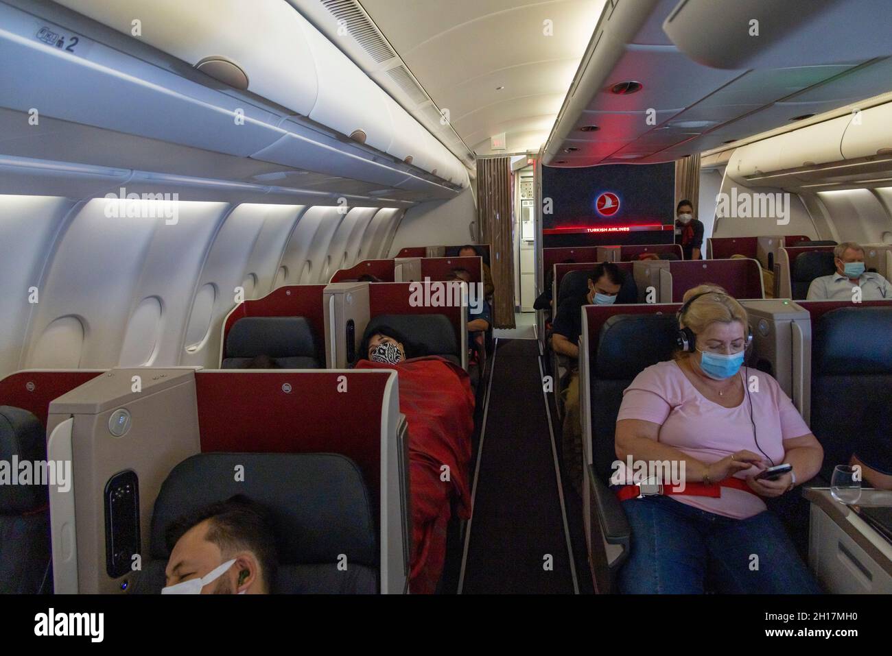 passengers in Turkish Airlines business class cabin Stock Photo