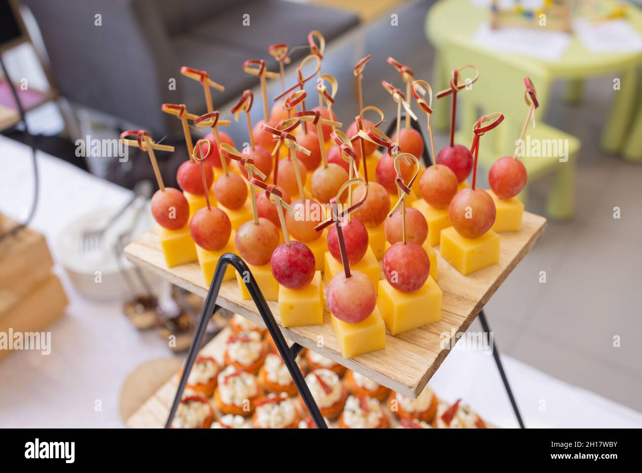Different types of canapes on buffet table Stock Photo