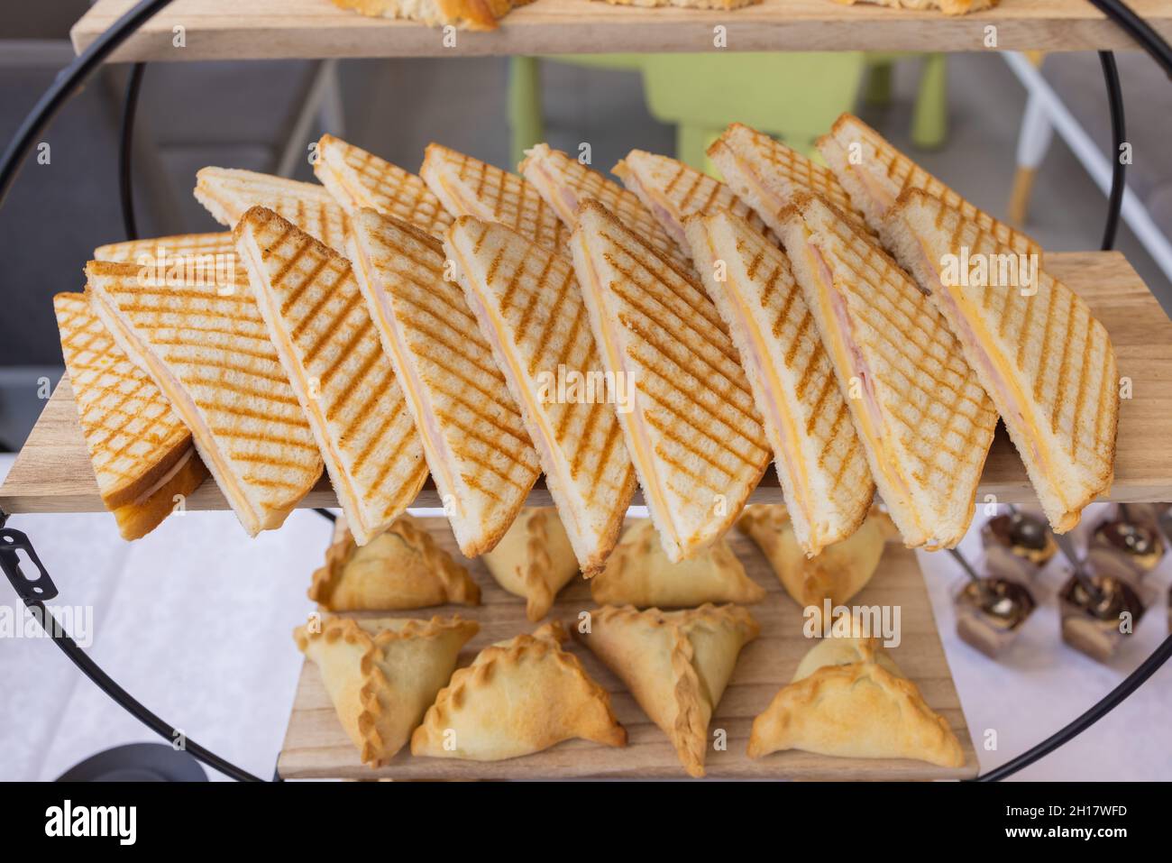 Different types of canapes on buffet table Stock Photo