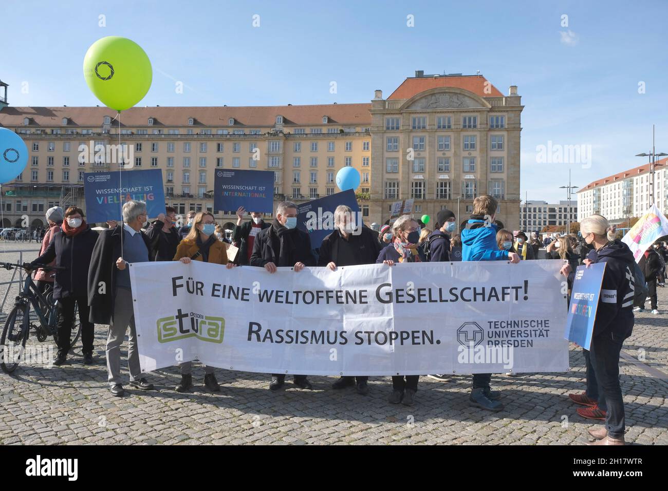 Dresden, Germany. 17th Oct, 2021. Demonstrators carry a banner reading 'For an open-minded society! Stop racism!' at the counter-demonstration on the 7th anniversary of the Pegida movement. Credit: Matthias Rietschel/dpa-Zentralbild/dpa/Alamy Live News Stock Photo