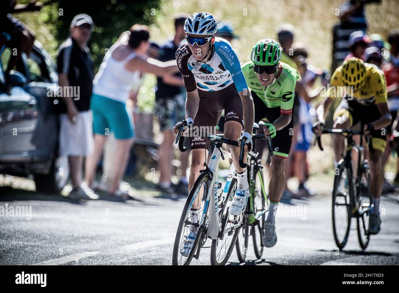 July 16th 2017, France; Cycling, Tour de France Stage 15: Romain Bardet leads Rigoberto Uran and Chris Froome over a small climb 5 km from the finish Stock Photo