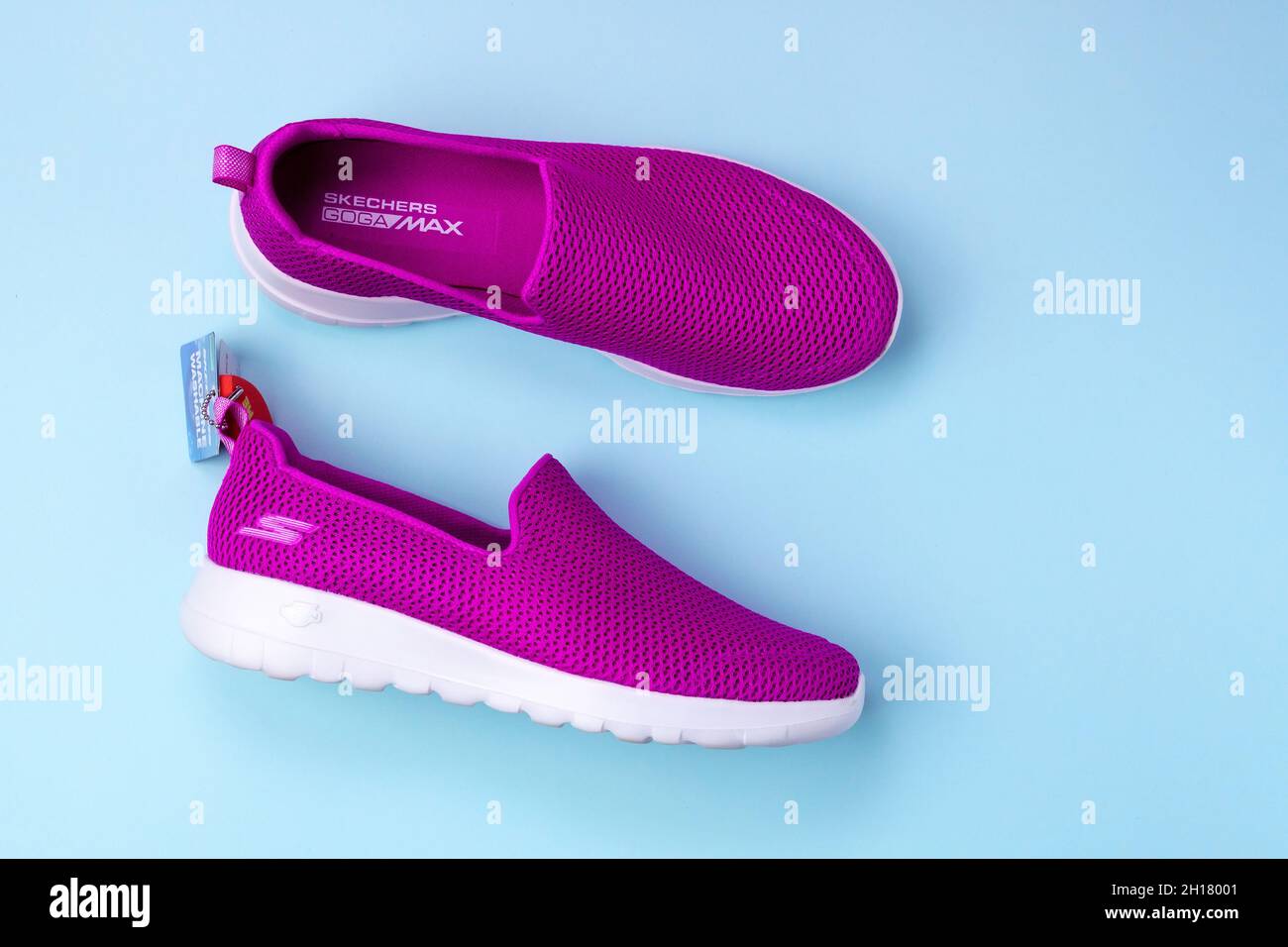 purple skechers go walk shoes