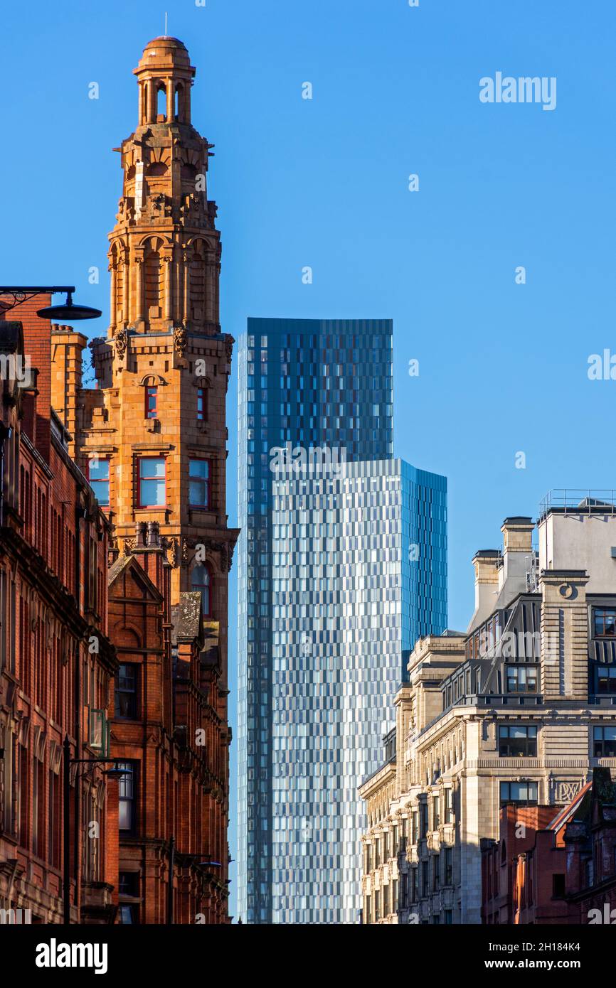 The tower of the Lancaster House building and two of the Deansgate Square tower blocks, from Whitworth Street, Manchester, England, UK Stock Photo