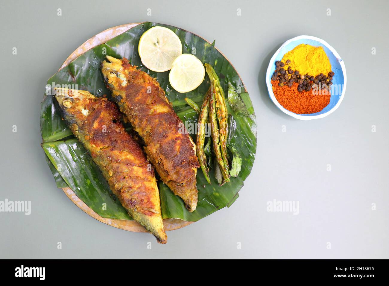 Indian Mackerel fish fry. Bangda Rava fry. whole Fried fish served on a