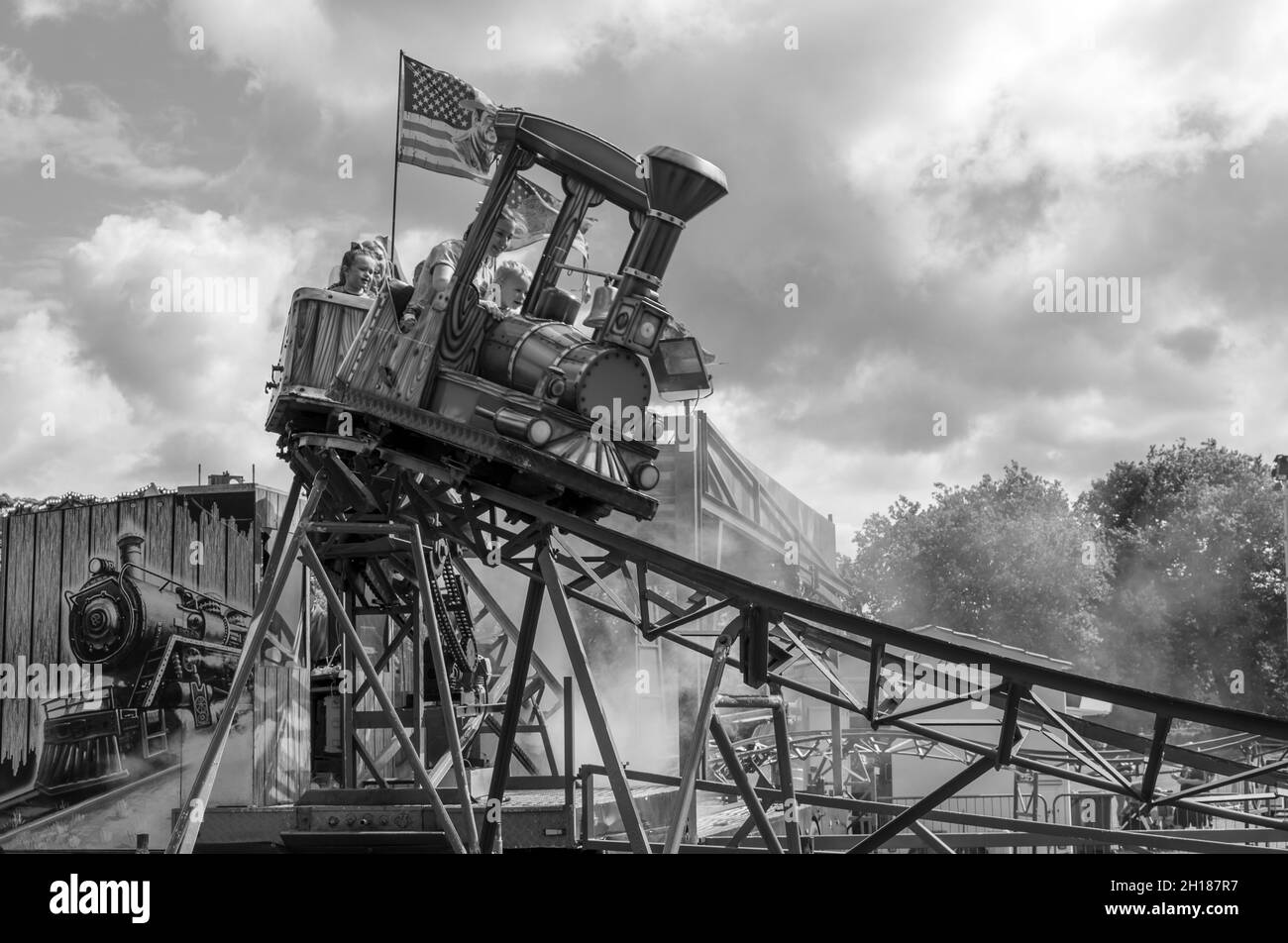 Monochrome runaway train fairground ride. Taken in 'The Walks', Kings Lynn on 28th Aug 2021. Stock Photo