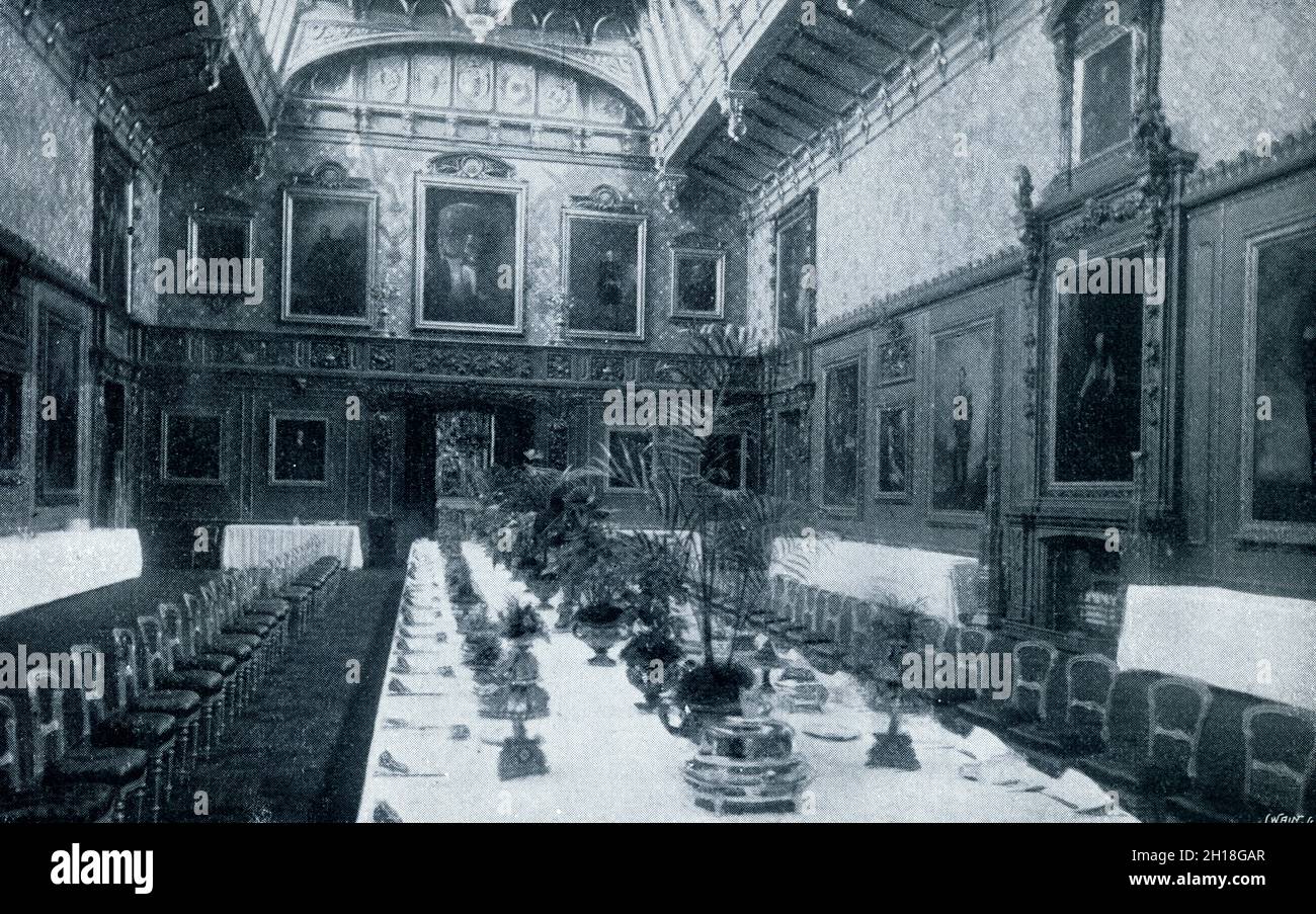 Waterloo Chamber at Windsor Castle in 19th Century Preparing for Banquet Dining Table Royal food Stock Photo