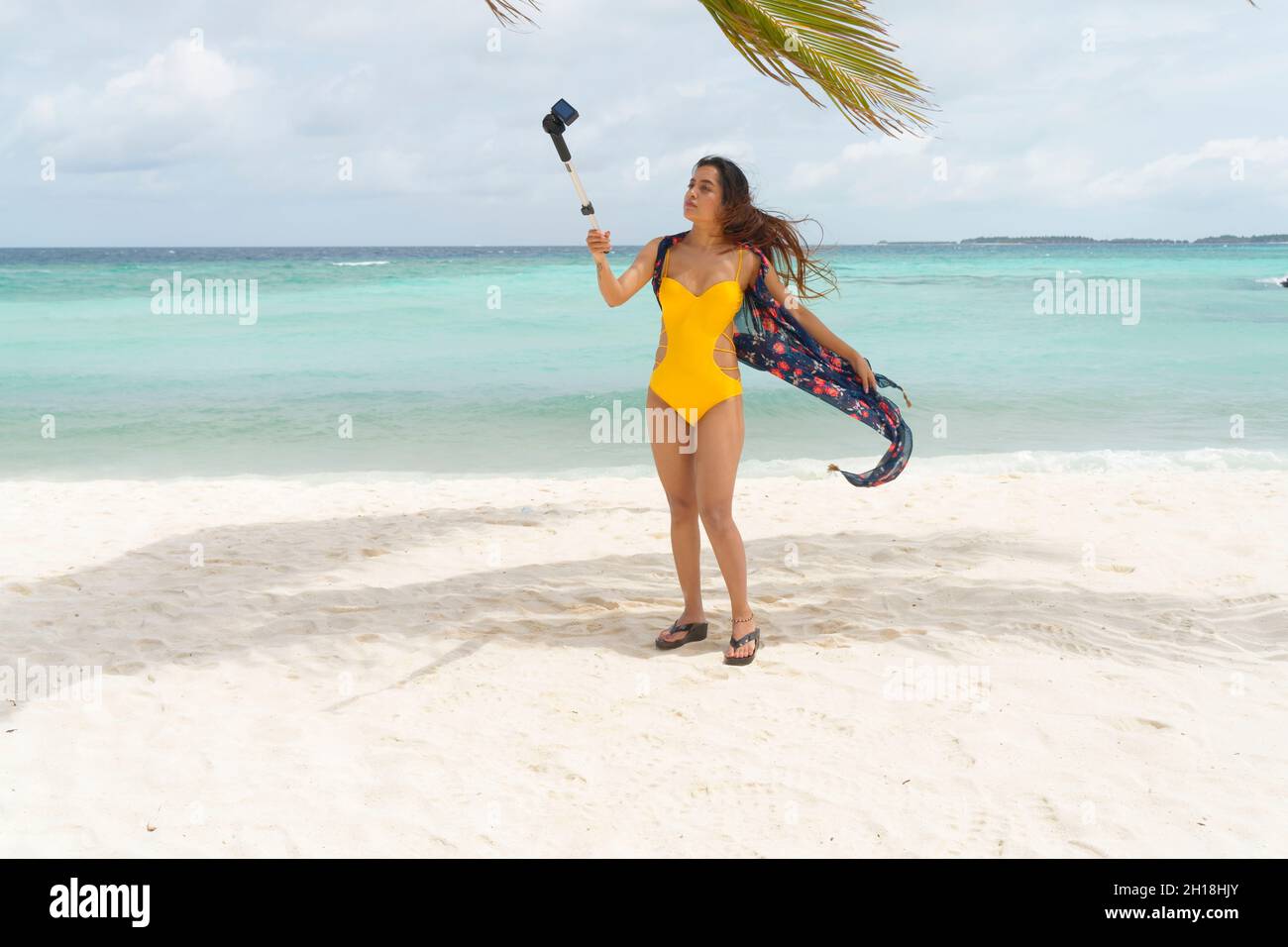 Young Indian girl in bikini enjoying on a beach at Maldives Stock Photo -  Alamy