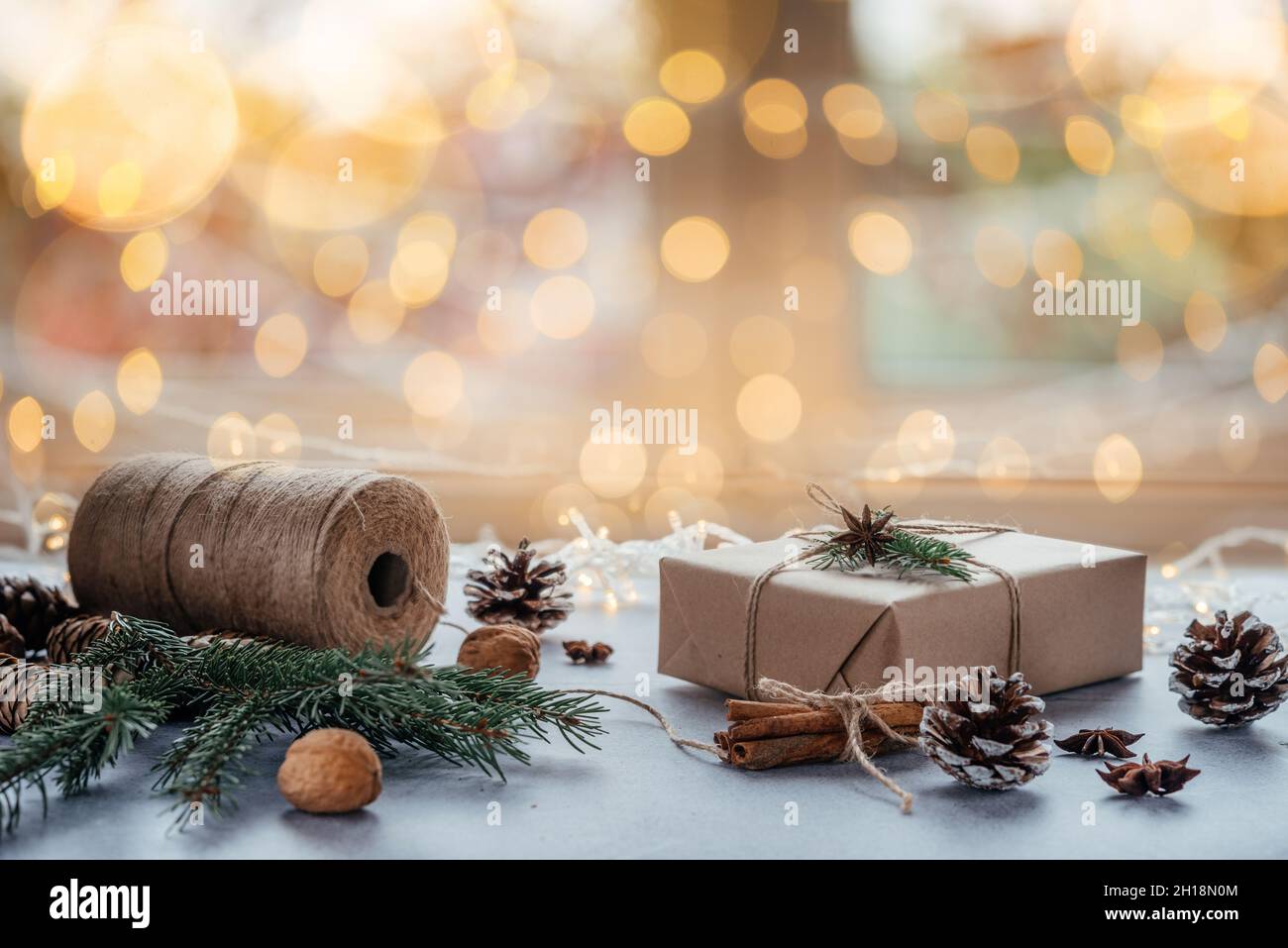 Christmas zero waste packaging gift boxes wrapped in kraft paper with ...