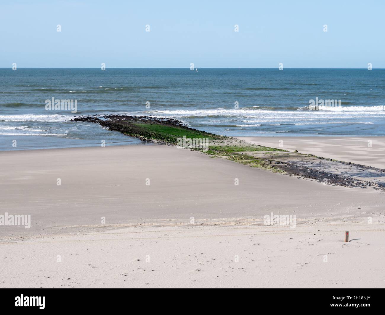 Breakwater on sandy beach of North Sea coast of West Frisian island Vlieland, Friesland, Netherlands Stock Photo