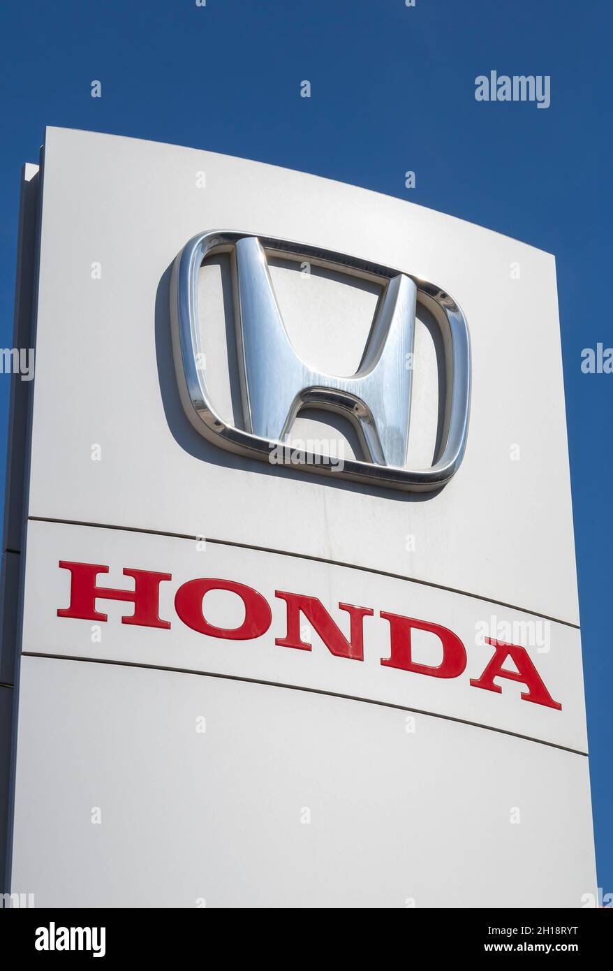 Málaga, Spain: October/17/2021; Brand logo at the entrance to Honda  store in Málaga city, Spain - Honda is a Japanese multinational car man Stock Photo