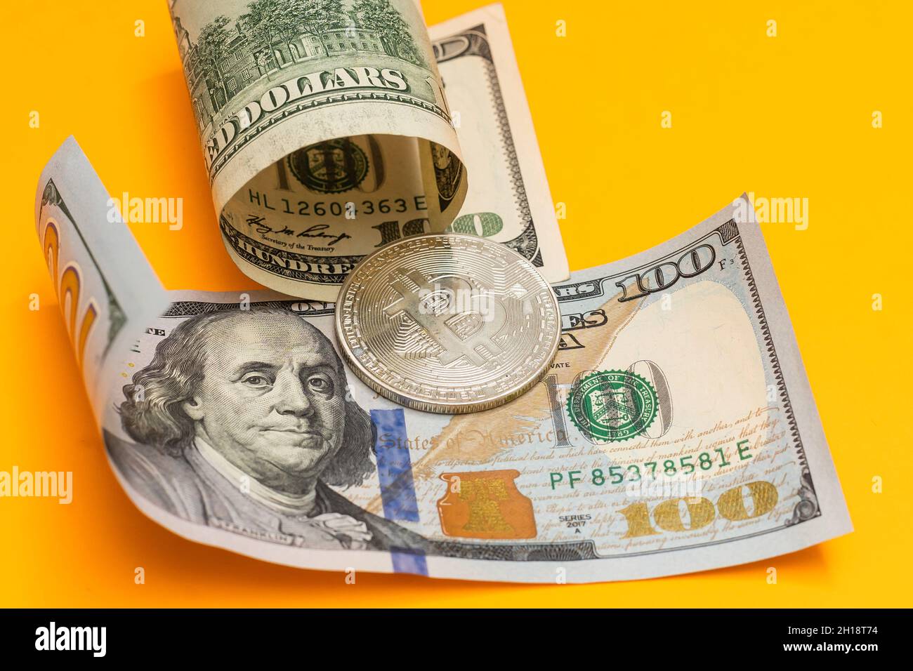 virtual money silver bitcoin on one dollar bill background. Concept of new  world order of cryptocurrency. Dirty money and world conspiracy Stock Photo  - Alamy