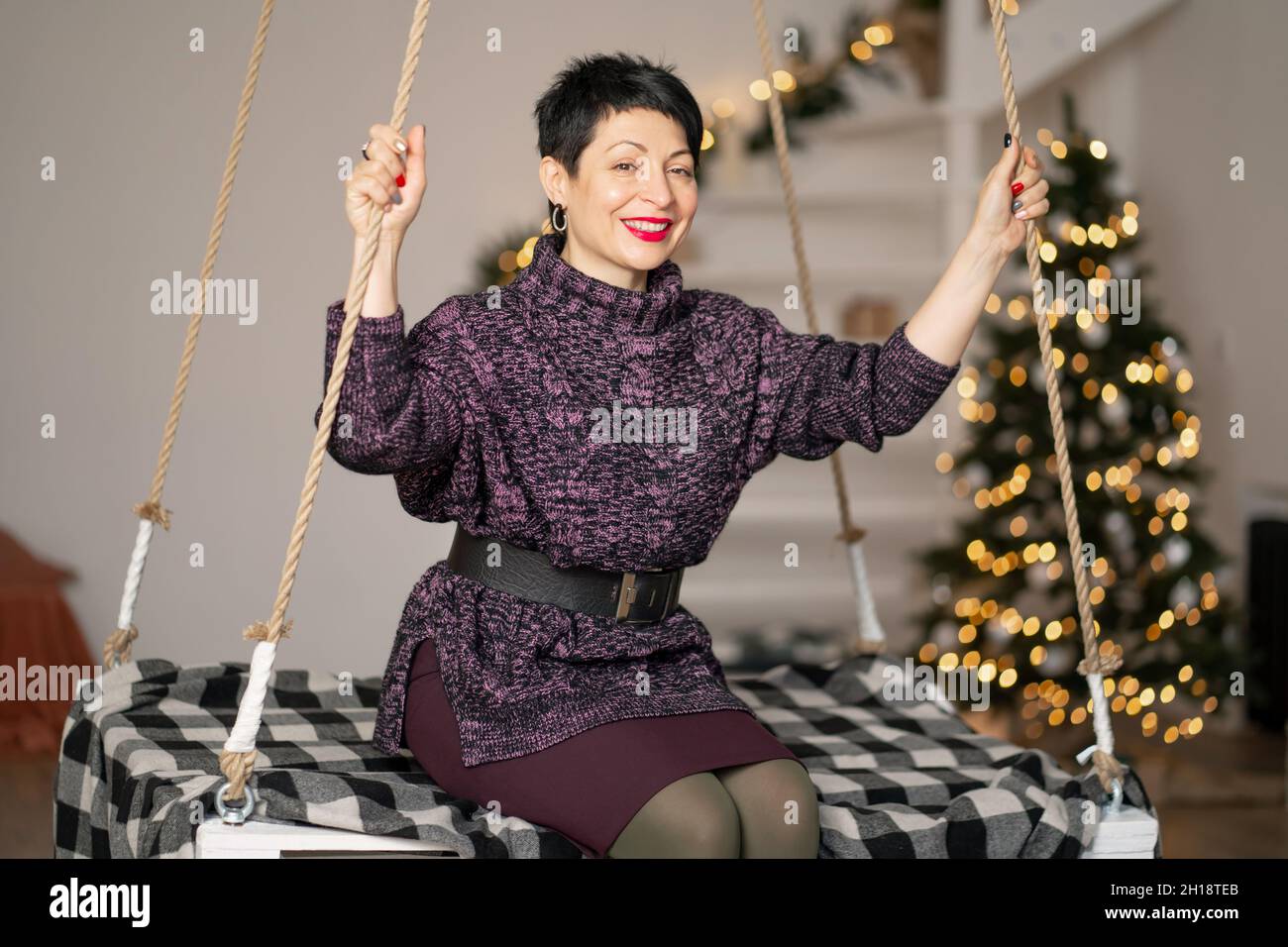 Older woman swinging hi-res stock photography and images - Alamy