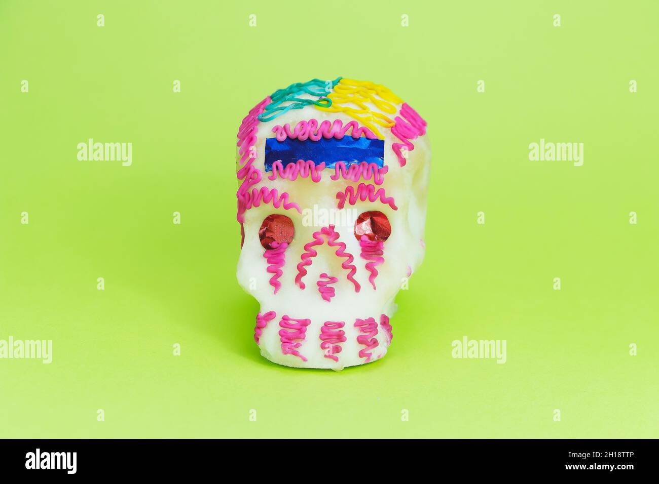 Mexican sugar skull (candy) for Day of the Dead celebrations, used for altars, called ofrendas, and tombs in Mexico. Stock Photo
