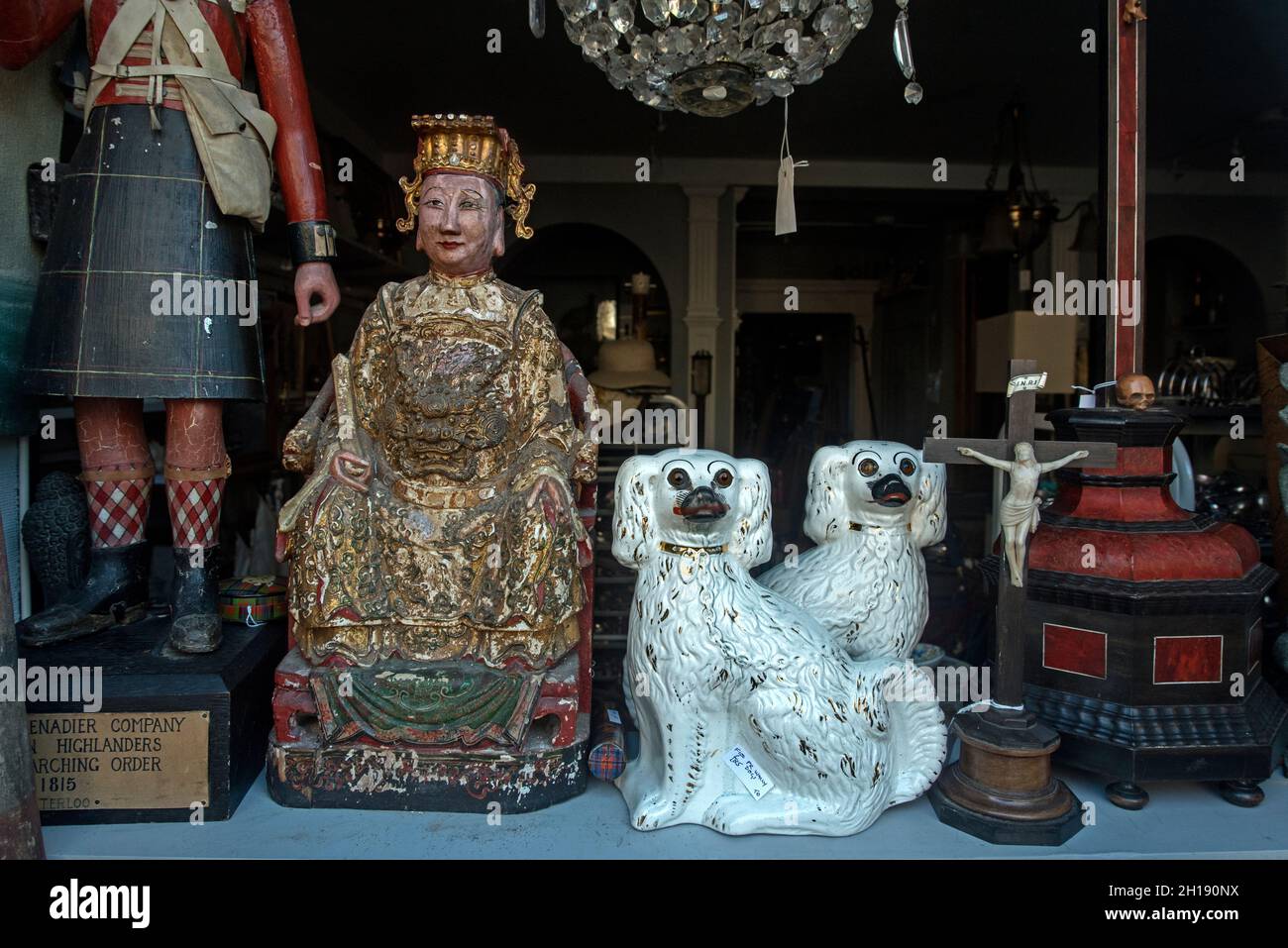 Antiques on display in the window of an antique shop in Dundas Street, New Town, Edinburgh, Scotland, UK. Stock Photo