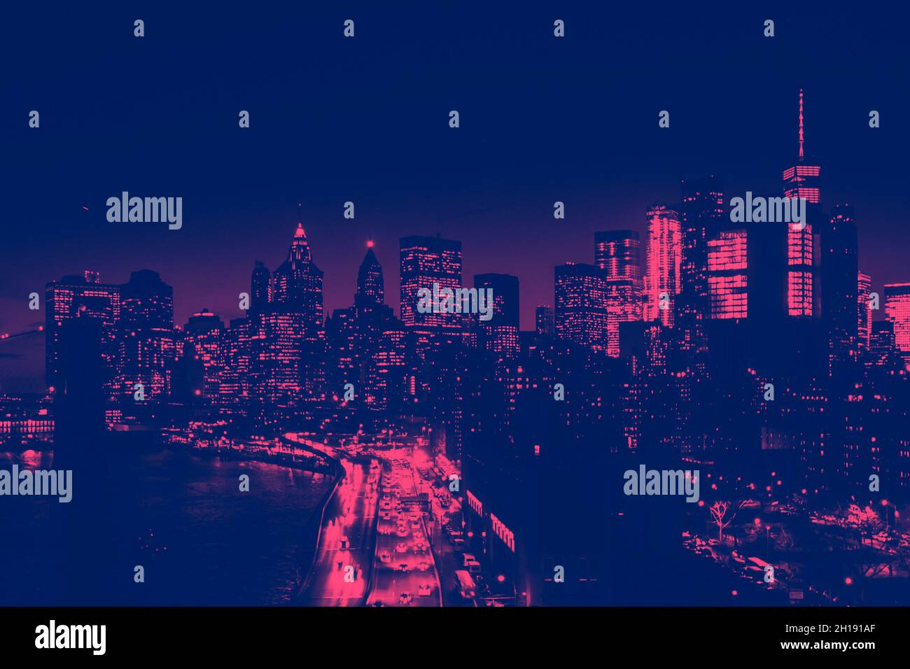 Lights of the downtown Manhattan skyline at night in New York City with ...