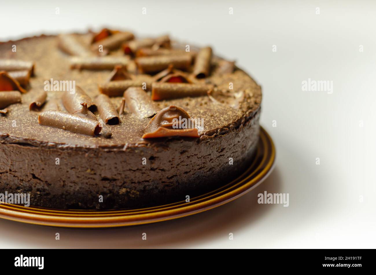Digestive biscuit base with chocolate cheesecake and pockets of salted