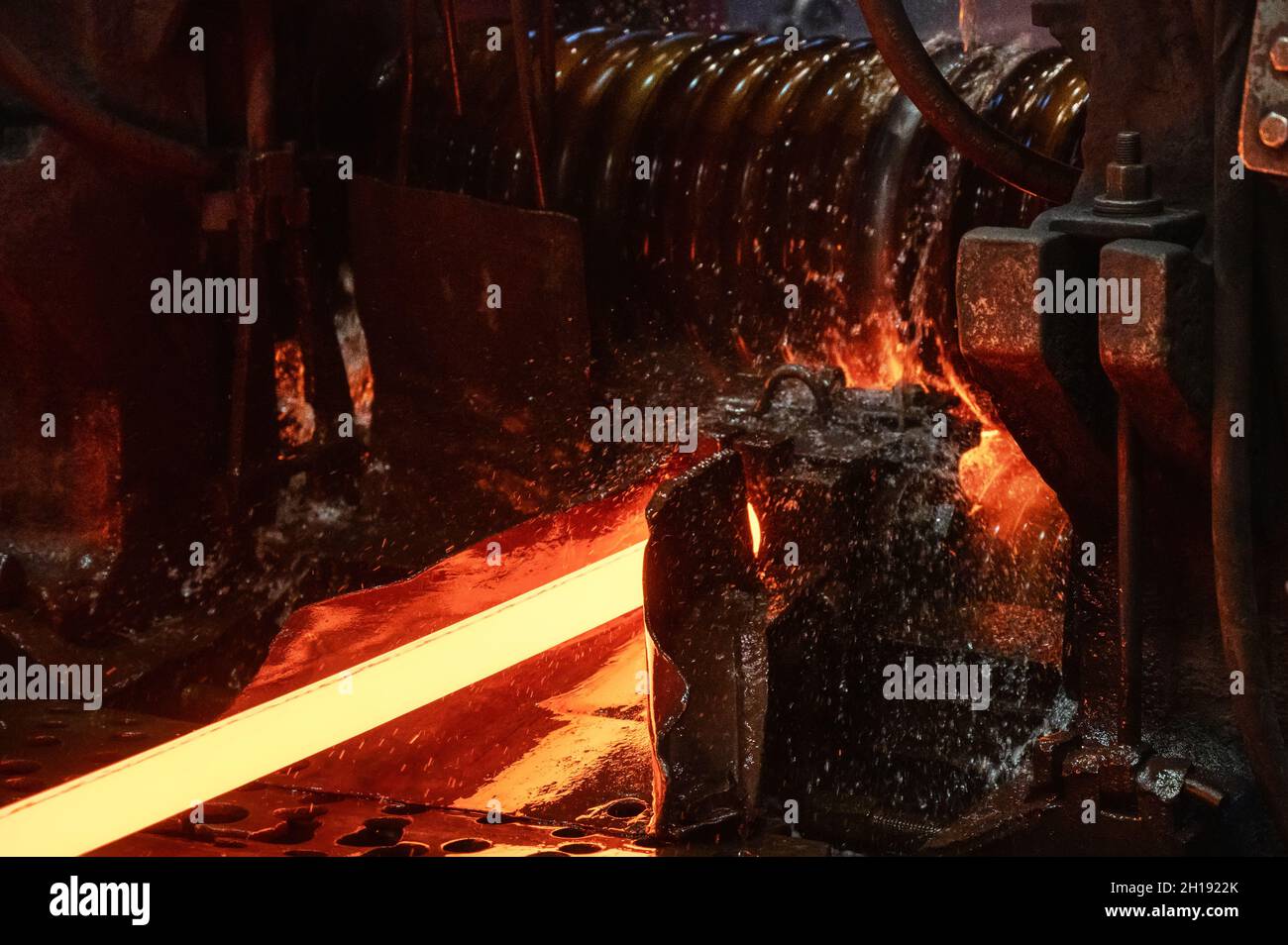 The rolling mill in operation. Manufacturing of hot rolled steel Stock