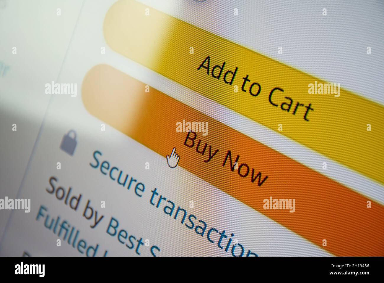 Buy now button on screen. Buying items online on amazon or ebay Stock