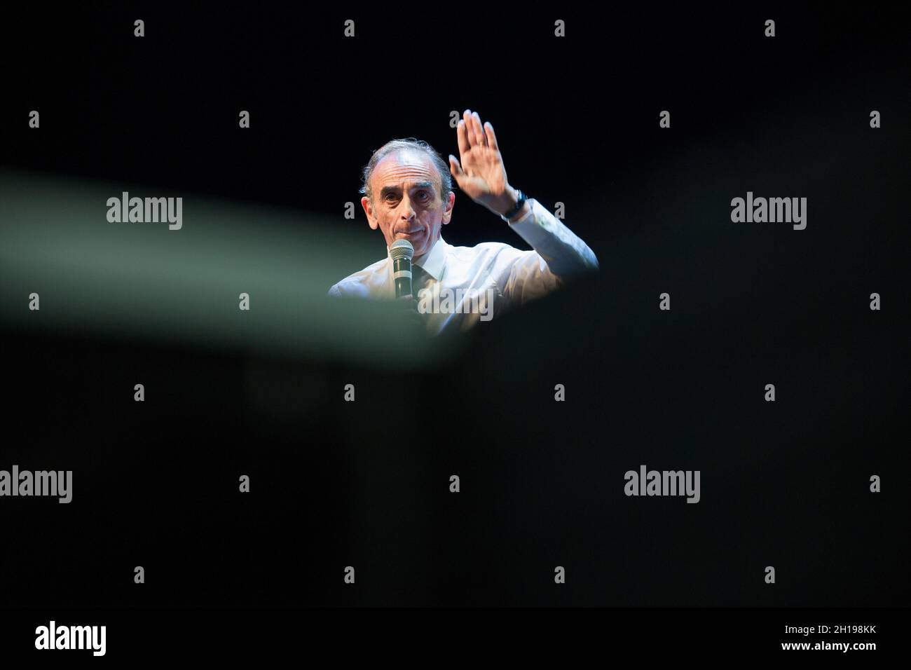 Eric Zemmour speaks on stage during a meeting in Beziers.Eric Zemmour held a meeting in Beziers at the invitation of its mayor Robert Menard, reputedly close to the Rassemblement National of Marine Le Pen. During his speech he particularly insisted on the degradation of the school system and castigated the policies carried out since after the war. He violently attacked the Marxist and progressive influence in force according to him within the Ministry of National Education in France. (Photo by Laurent Coust/SOPA Images/Sipa USA) Stock Photo