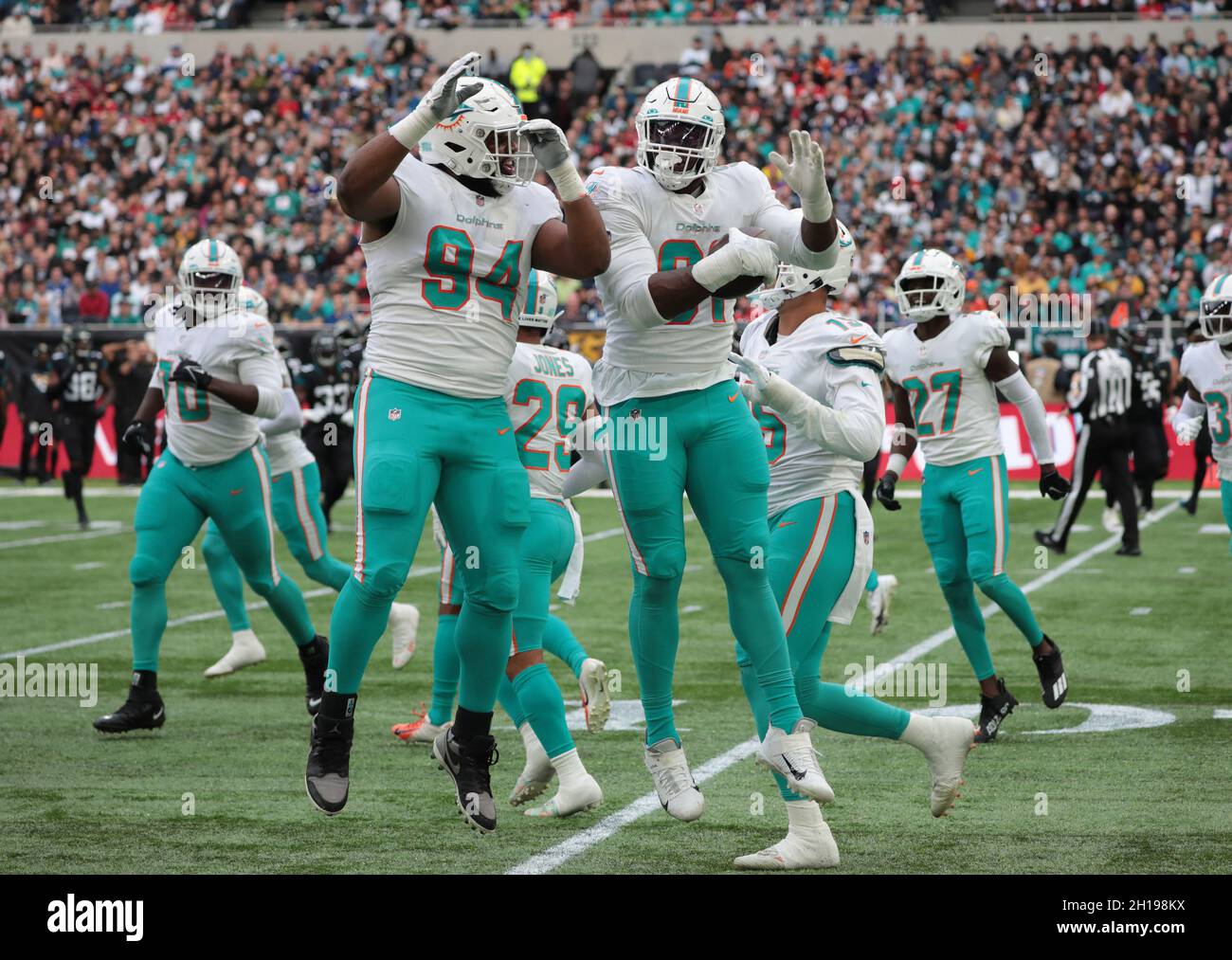 London, UK. 17th Oct, 2021. Miami Dolphins Christian Wilkins (L