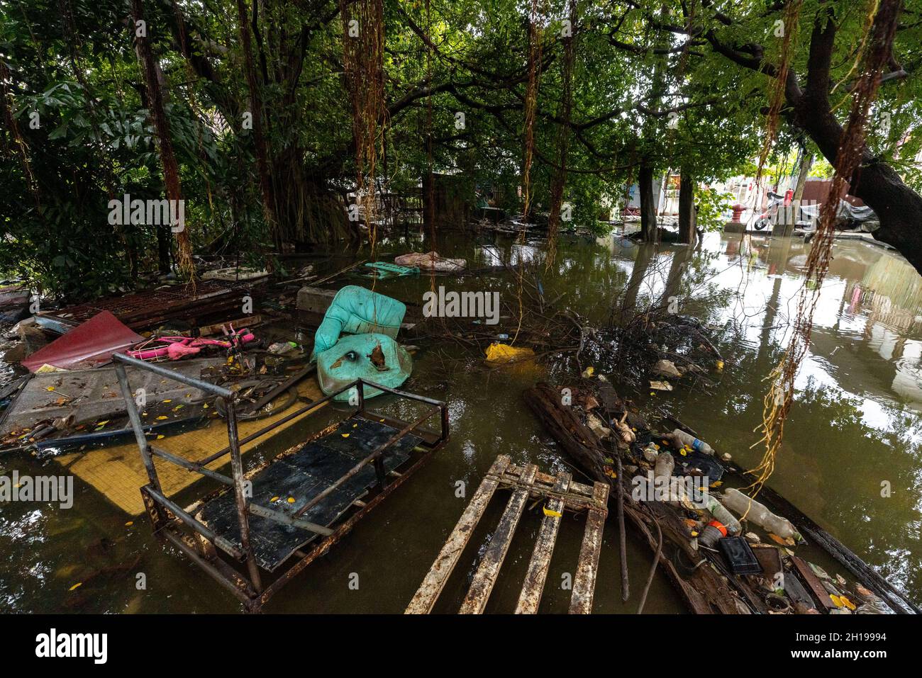 Bangkok, Thailand. 17th Oct, 2021. Submerged public community area is seen after heavy flooding.Santichon Songkroh community, a small community along Bangkok Noi Canal is now facing daily flood influenced from water walls leakage and heavy rainfall from Tropical Storm Kompasu. Credit: SOPA Images Limited/Alamy Live News Stock Photo
