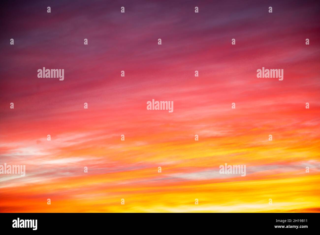 Beautifully Dramatic Sunrise or Sunset with Clouds. Stock Photo